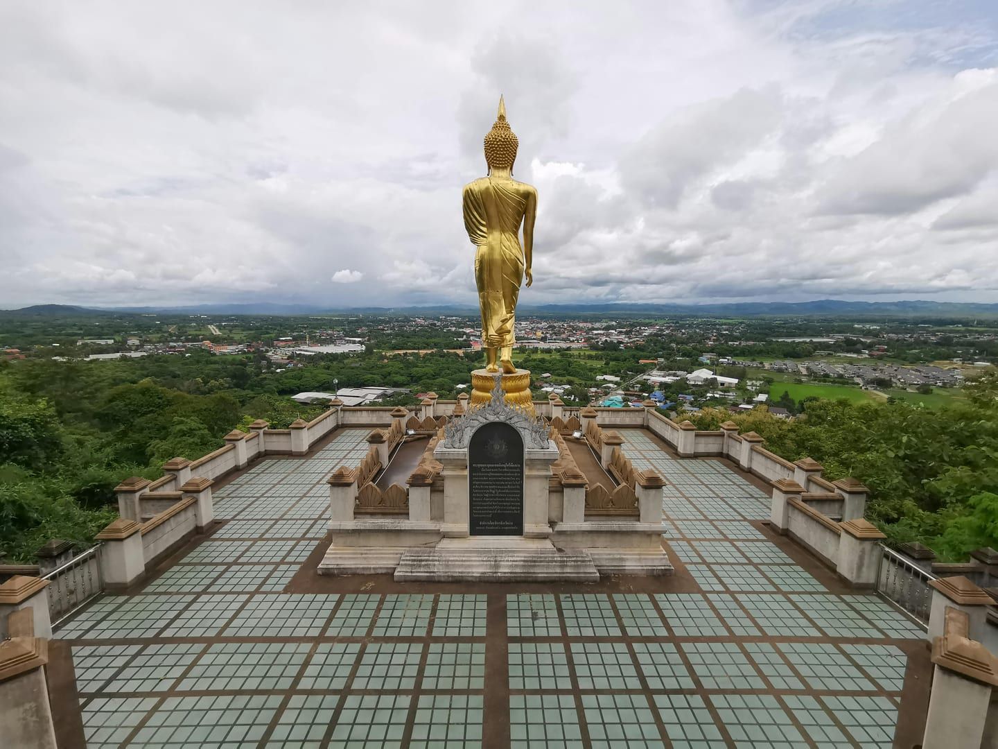Dark Buddha statue inside the Golden Pavilion