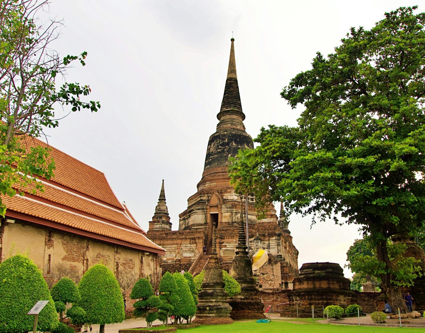 Historic Thai temple architecture with stupas and greenery at oldest temple Koh Samui