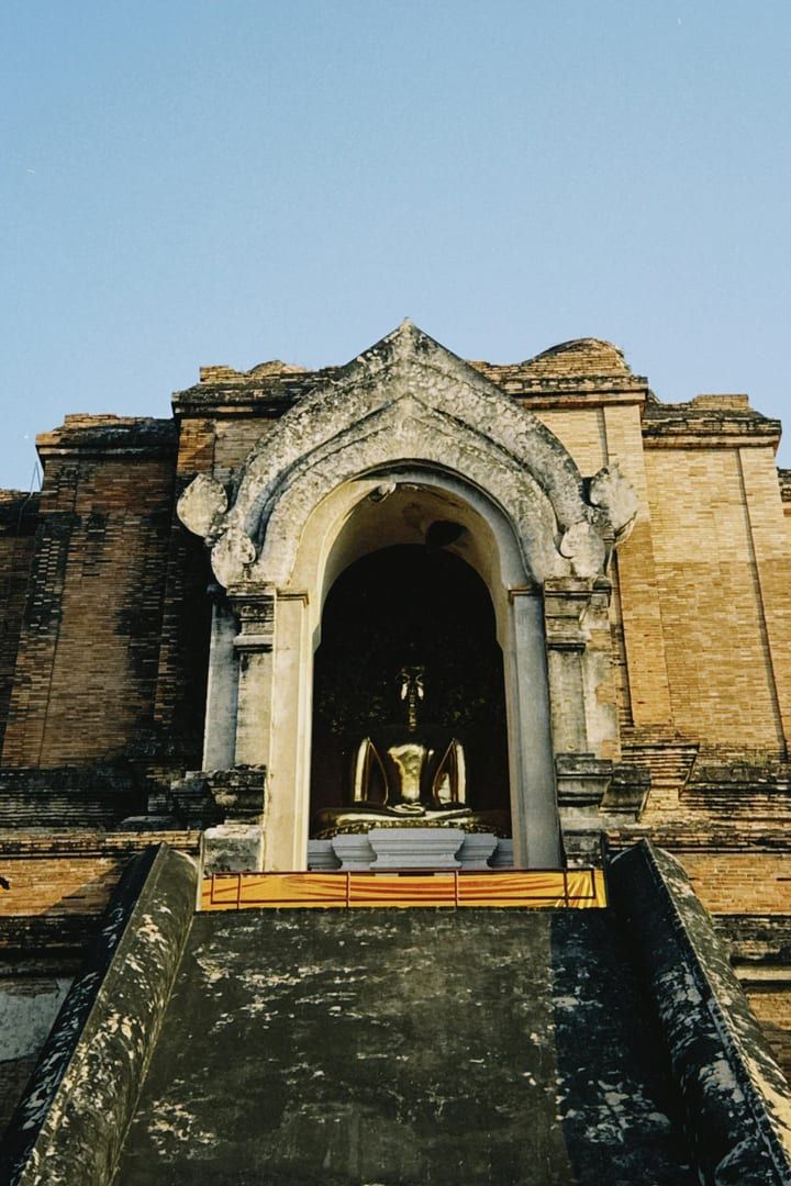 Historic Buddhist temple facade showing ancient architectural details at hidden temple Koh Samui