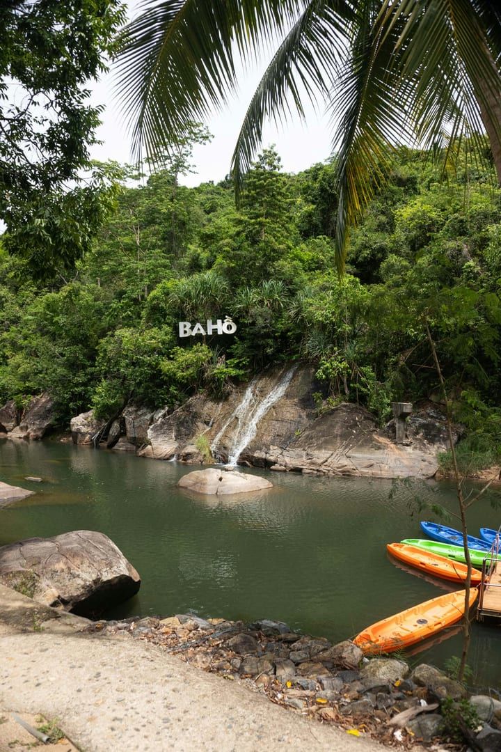 Greenery surrounding Hin Lad waterfall trail with jungle kayaking