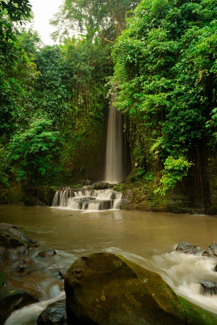 Small natural pool at the base of a quiet waterfall Koh Samui