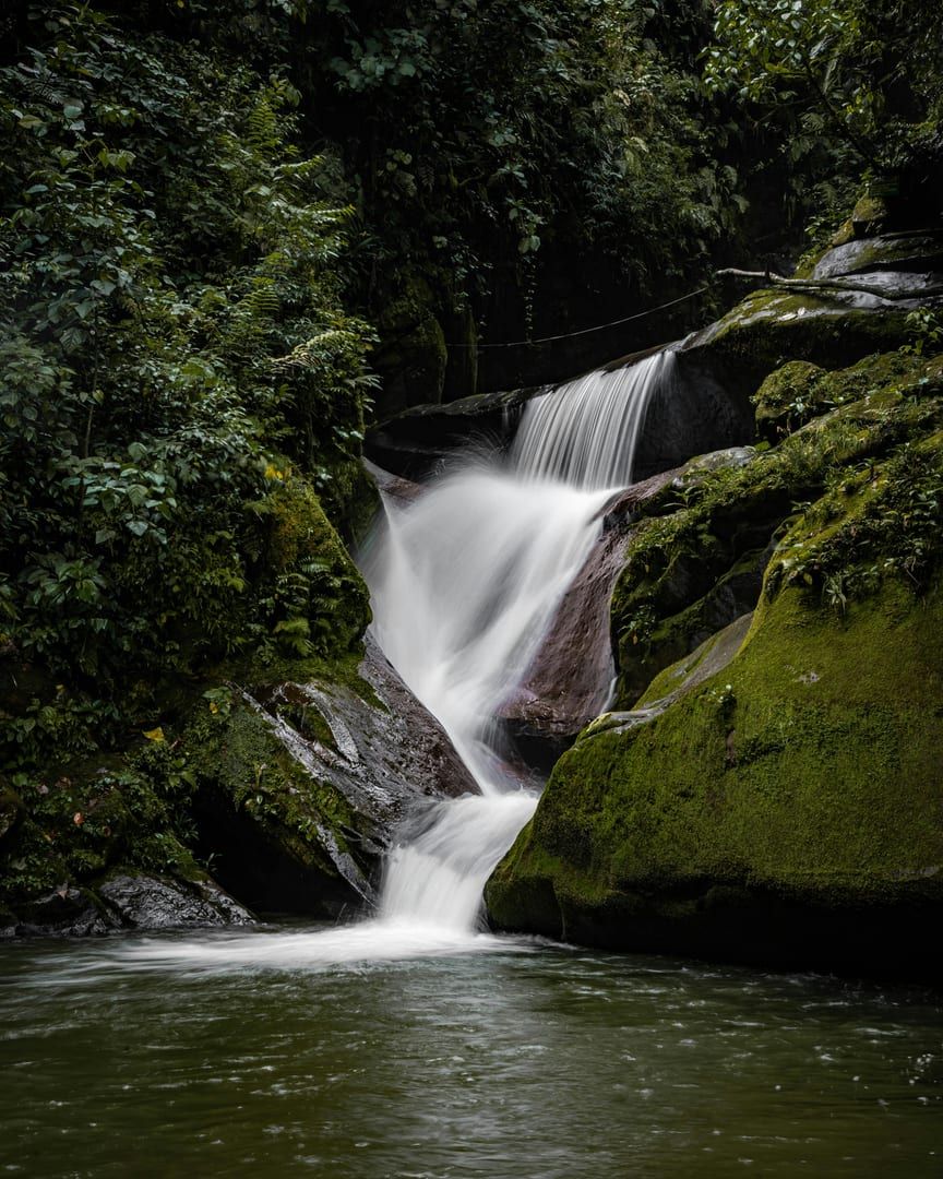 Lush greenery surrounding Wang Sao Thong Waterfall